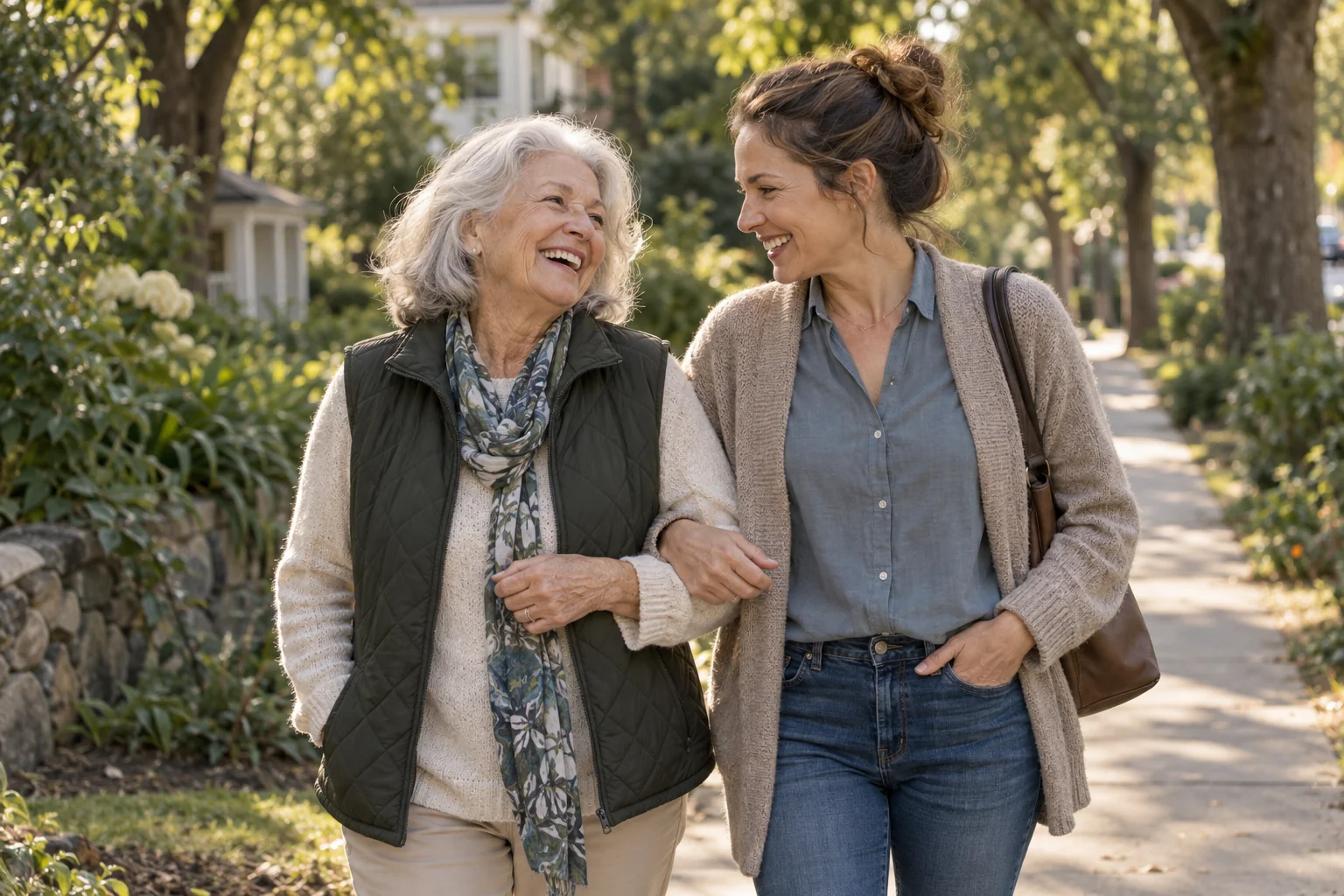 An older woman and her adult daughter sharing a happy moment together
